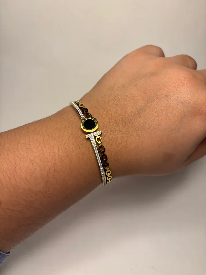 Sleek Black and Gold Cuff Bracelet 2.webp